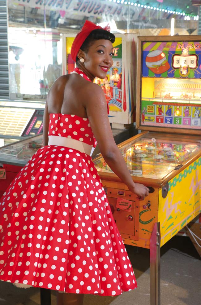 Sandy tries her luck in the arcade.