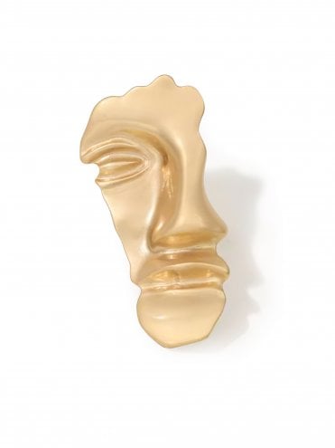 Half face brooch