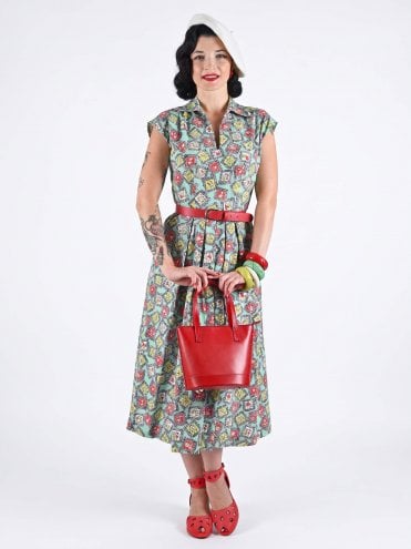 Portrait Green 1940s Runaround Sue day dress with winged collar and pockets